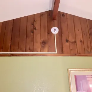 The non-functional smoke detector and its creative wiring.
