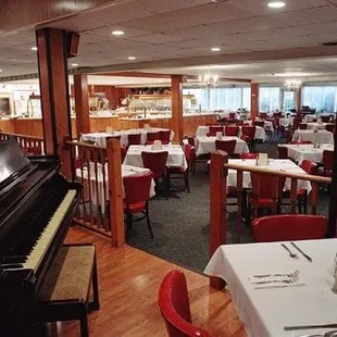 piano and dining room