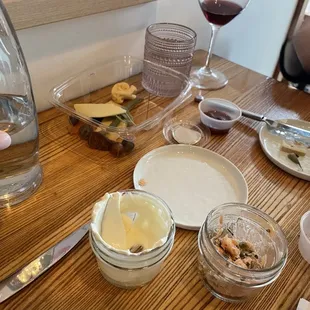 $10 for the goat cheese jar, $10 for the mini salmon jar, $14 for a box of a couple cheese slices and some pickled veggies.