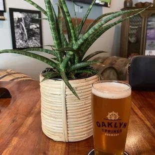 a glass of beer on a table