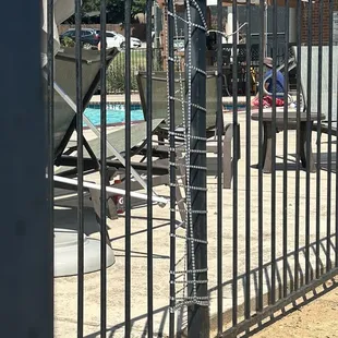 Broken fence held together with rope?!?