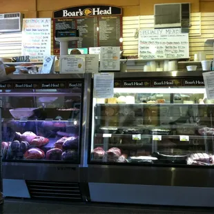 a display of meats and pastries