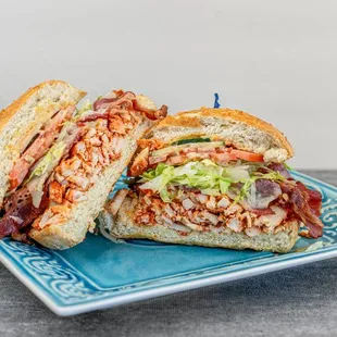 Introducing the savory sensation of crispy bacon and tender chicken in a hearty sub sandwich.
