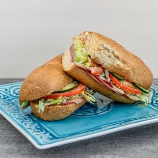 Indulge in classic deli perfection with our &apos;Salam Bhai&apos; sub - a mouthwatering blend of two savory classics in one satisfying sandwich.