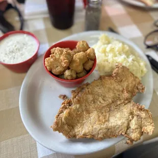 Chicken Fried Chicken with mashed potatoes, fried okra and cream gravy