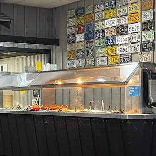 a buffet area with a variety of food items