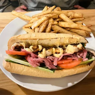 Cajun Shrimp Po&apos;boy with beer battered fries