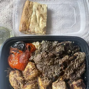 Kabab Combo: Rice, Chicken, Tikka, Tomato, Pita bread and green sauce