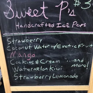  a blackboard with a price list