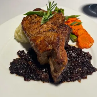 a plate of meat and vegetables