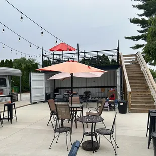  patio area with tables and chairs