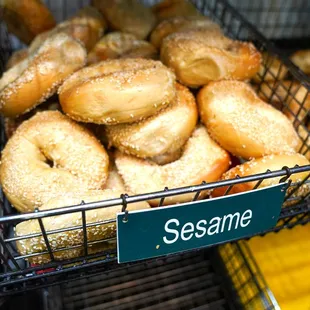 a basket of sesame bagels