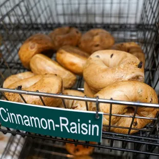 cinnamon raisin bagels in a wire basket