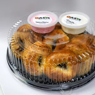 a variety of pastries in a plastic container