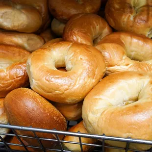 a wire basket full of bagels