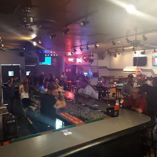 Bartender and patrons