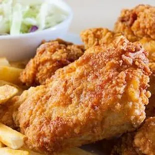 a plate of fried chicken and french fries