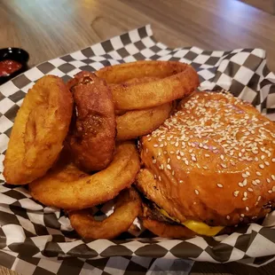 Cheeseburger ($6.99) + onion rings &amp; soda ($4.00 extra)