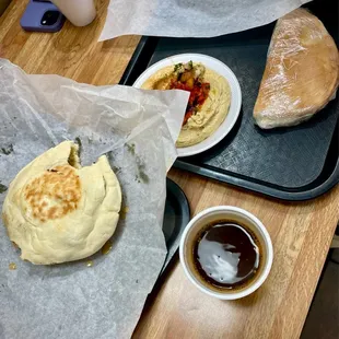 a plate of food and a cup of coffee