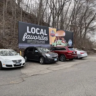 several cars parked in a parking lot