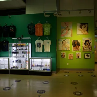 Oasis Dispensary - Merchandise, accessories, artist of the quarter wall, &amp; display cases.