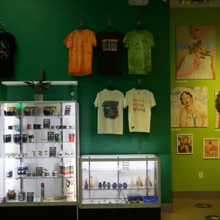 Oasis Dispensary - Merchandise, accessories, artist of the quarter wall, &amp; display cases.