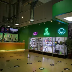 Oasis Dispensary - House brands (PUF, City Trees, &amp; Naked City) &amp; featured brand display cases.