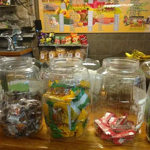 a variety of candy in jars