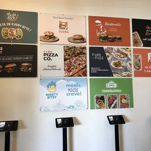 a variety of posters on the wall
