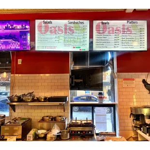 Wall Menu @ Oasis Fresh. 500 W Diversey Pkwy, Chicago, IL . Salads Sandwich mes Bowls Platters . Shawarma Tikka Gyro Kefta.Cool .