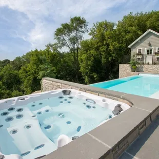 Dimension One Spas, Hot Tubs, Swim Spas. #1 Hot Tub Store in EL Paso Texas. The best hot tubs.