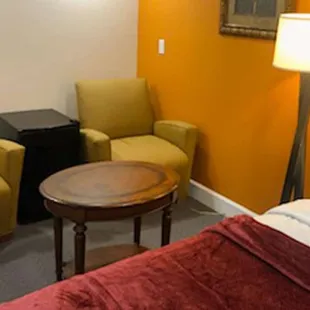 MH OasisInnSuites Ridgecrest CA Guestroom TwoQueenSofa