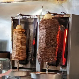 a man preparing food in a restaurant