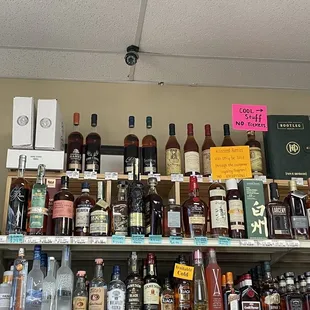 a variety of liquor bottles on a shelf