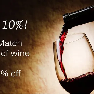 wine being poured into a glass