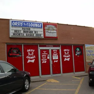a car parked in front of a restaurant
