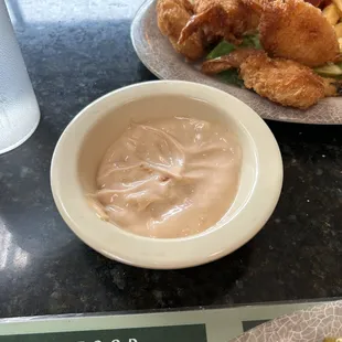 This is suppose to be cocktail sauce but it's just mayonnaise mixed with something pink for color.
