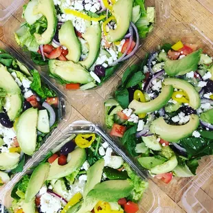 Greek salad for a dollar more add avocado or chicken.      With your choice of dressing.