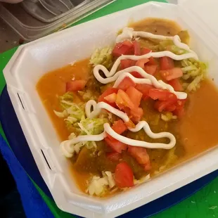 a meal in a styrofoam container