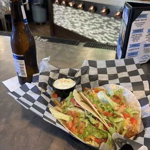 Fish Tacos with a cold bottle of beer