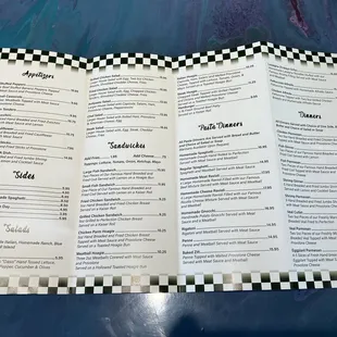 a checkered menu on a table