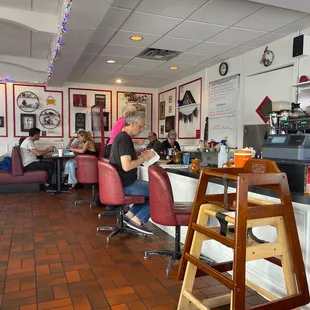 a woman sitting at a counter