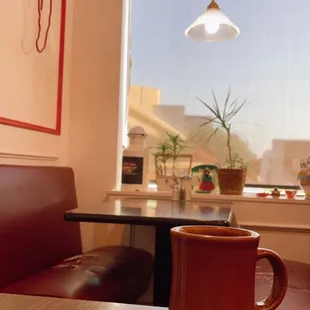 a cup of coffee on a table