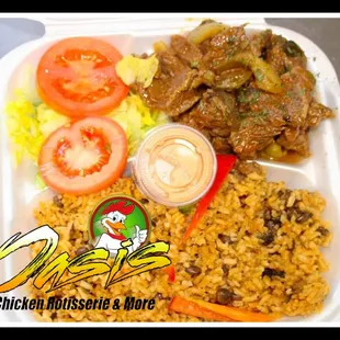 Yellow Rice and Onion Cubed Steak on Red Sauce  Arroz Con Gandules con Bistec Encebollado en Salsa