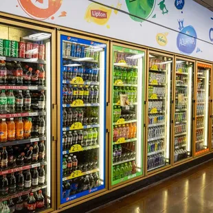 a row of refrigerated drinks