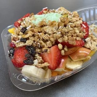a bowl of fruit and granola