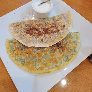 One is Stuffed with meat and the other spinach and cheese. (Appetizers)