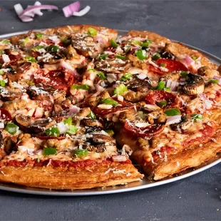 a whole pizza on a pan