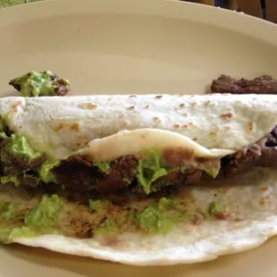 Carne asada burrito(I added avocado). Great homeade flour tortillas were the highlight of the place. Good carne asada.