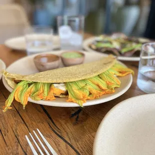 My absolute favorite menu item. Flor De Calabaza - Squash blossom, Oaxaca cheese, sautéed mushrooms, roasted onions, assorted salsa